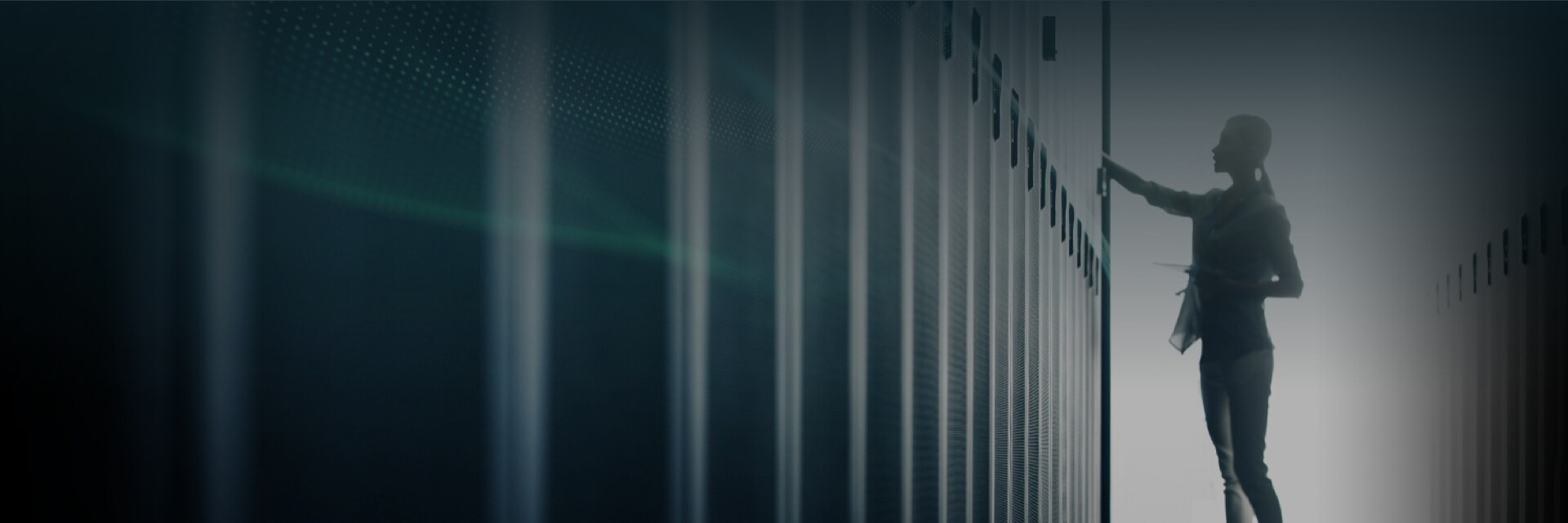 An illustrative image of a person in a server room.