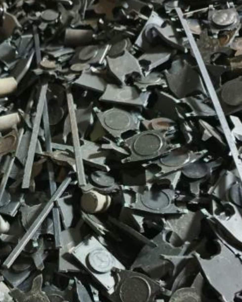 A pile of black pieces of plastic.